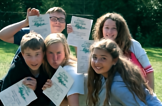 Campers holding certificates at Camp Can-Aqua